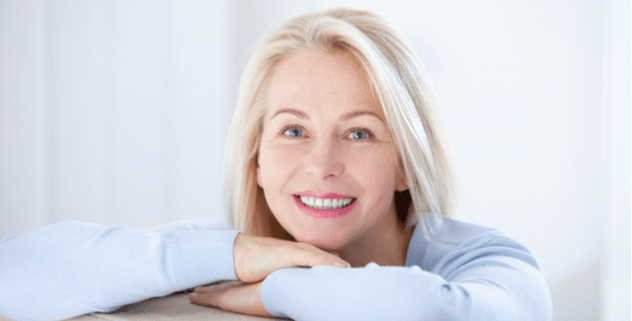 middle aged woman smiling friendly