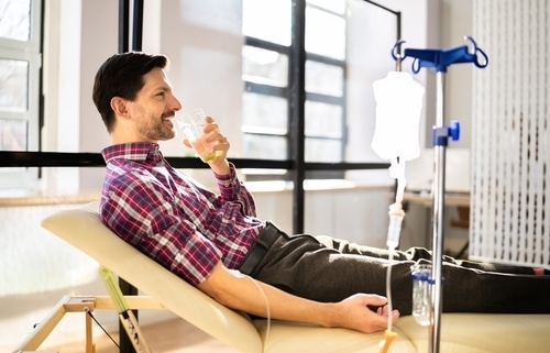 Vitamin Therapy IV Drip Infusion In Man Blood