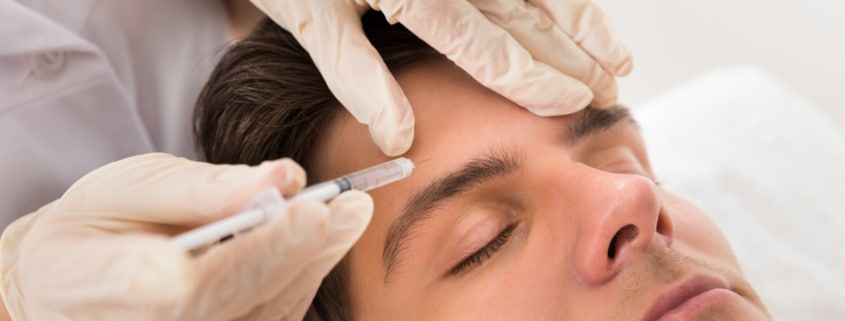 Man receiving Botox injection for wrinkle smoothing and facial rejuvenation at cosmetic clinic